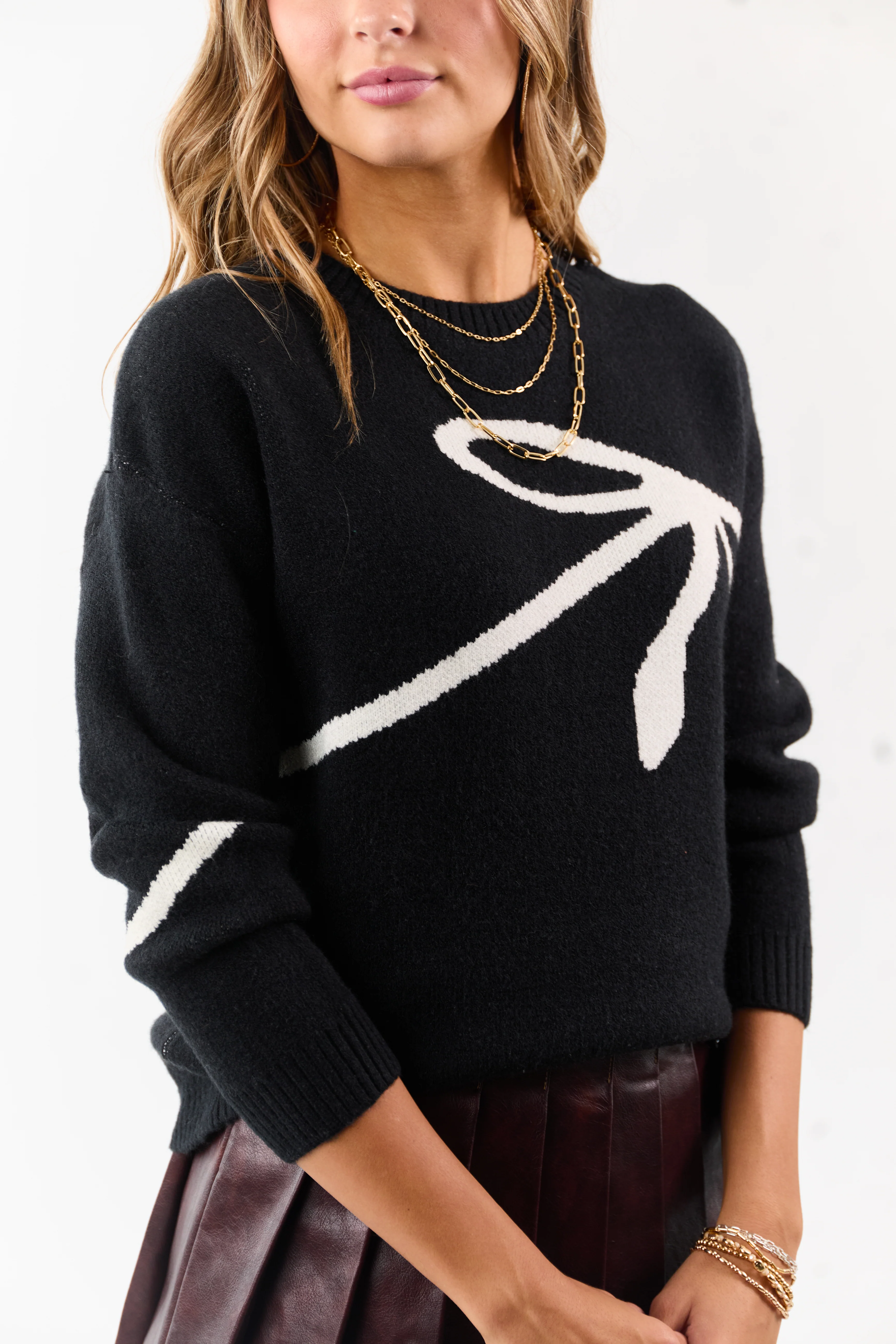 Black and Ivory Bow Graphic Relaxed Knit Sweater - Image 6